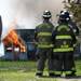 Firefighters watch as a small structure is engulfed in flames during a training exercise and controlled burn in 6700 block of Warner Rd. in Pittsfield Township on Thursday, May 9, 2013. Melanie Maxwell I AnnArbor.com